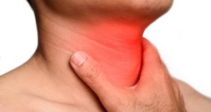 Redness at neck of Asian, Myanmar man. Concept of sore throat, pharyngitis, laryngitis or dysphagia.